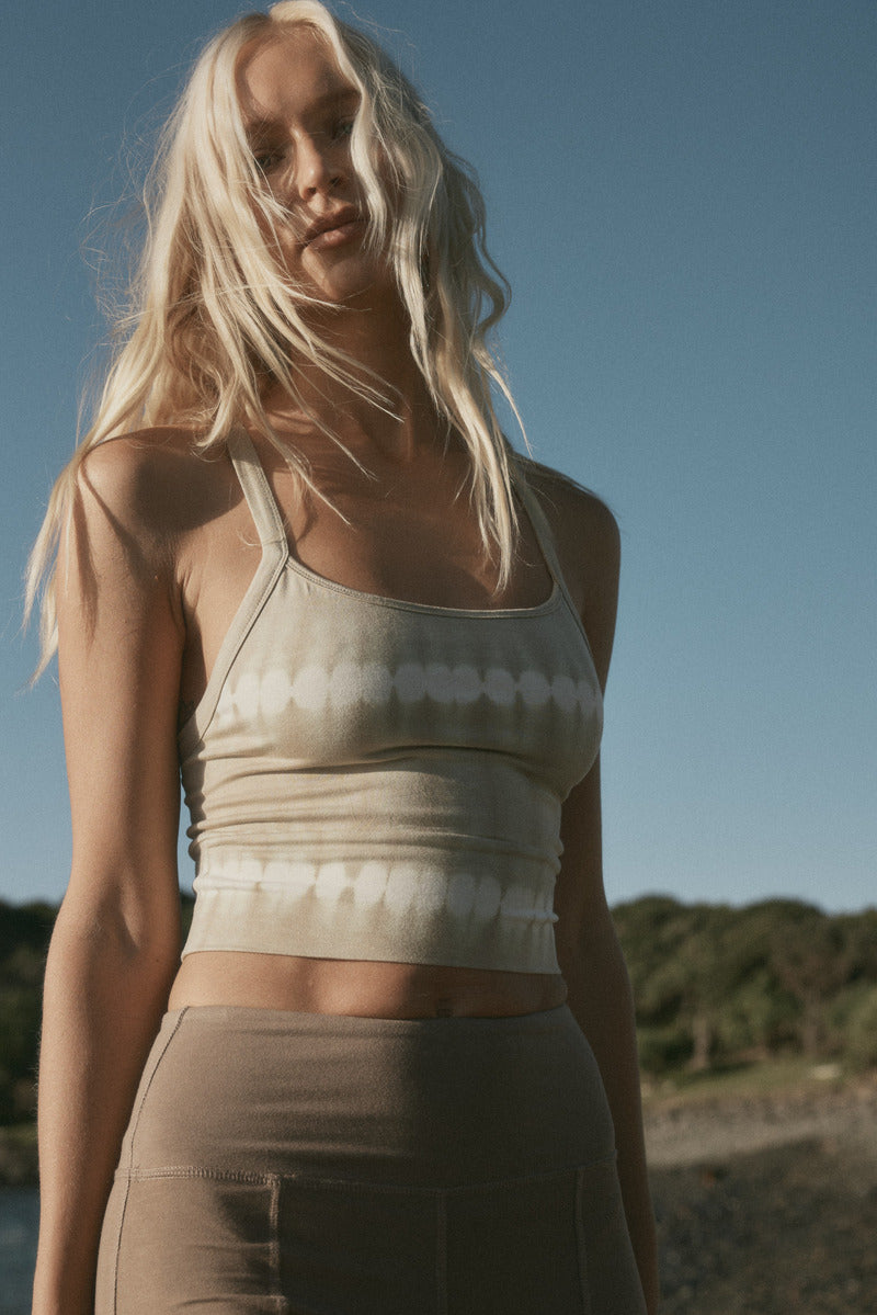 brown stretch pant and tie dye bralette front view