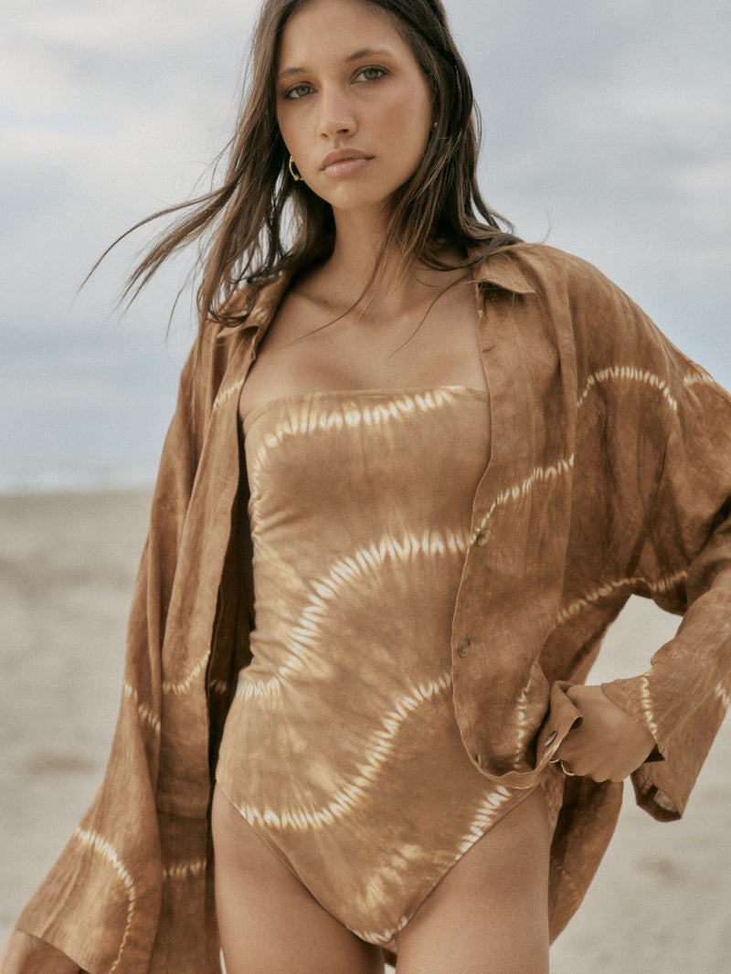 womens tan tie dye strapless bodysuit paired with shirt