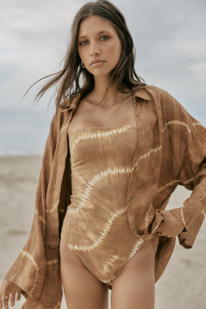 womens tan tie dye strapless bodysuit paired with shirt