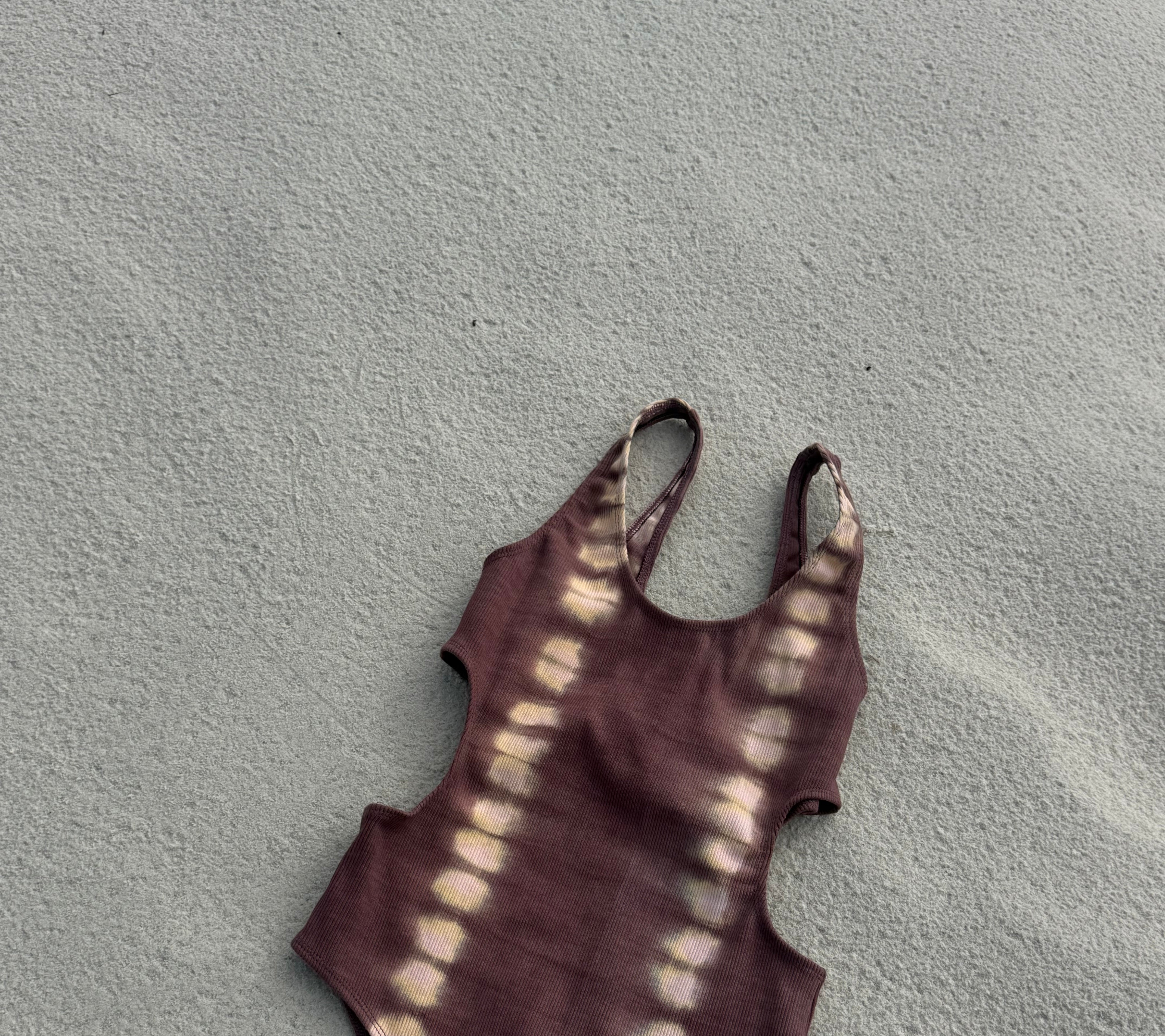 WOMENS COTTON tie dye mauve bodysuit flat lay