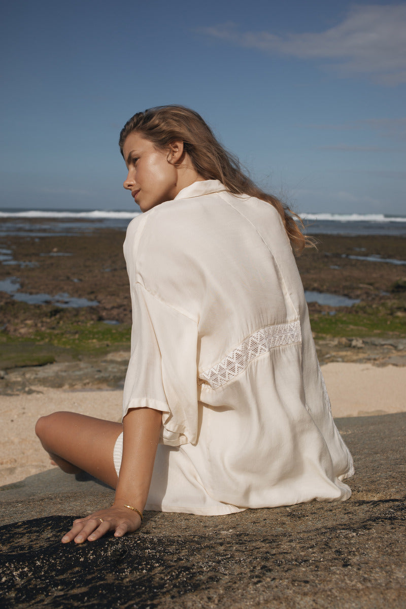 Womens cream coloured viscose lace shirt, back view