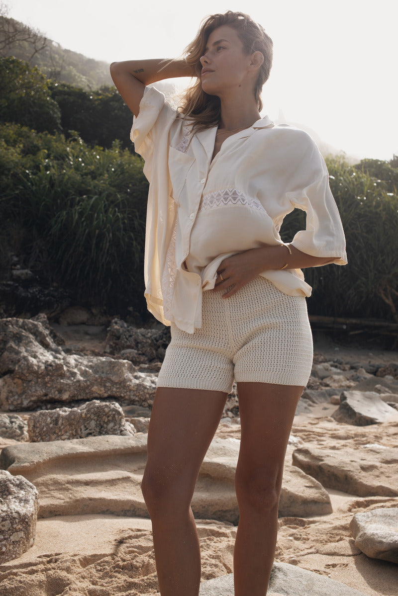 womens viscose lace cream shirt styled with matching knit short, front view