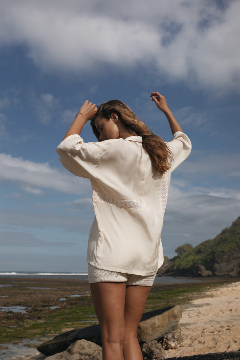 Womens cream coloured viscose lace shirt, back view