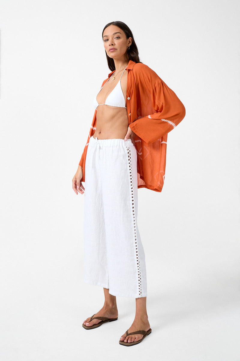 Womens white linen drawstring pant with crochet panels side view