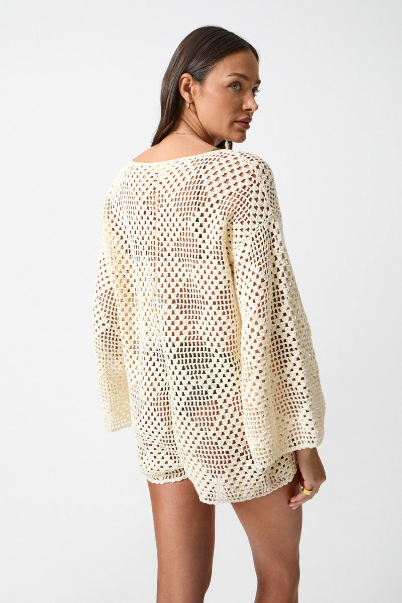 womens crochet cream jumpsuit side view