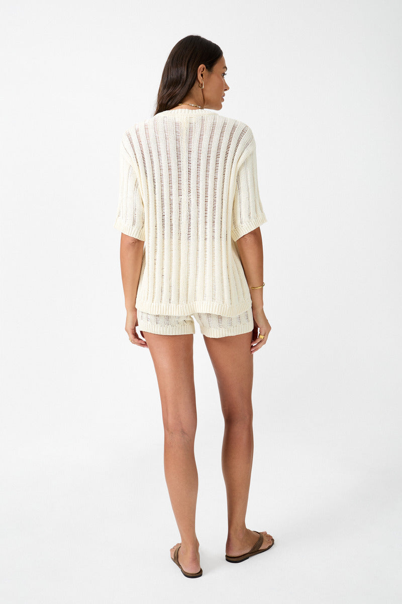 womens cotton cream crew neck knit tee back view