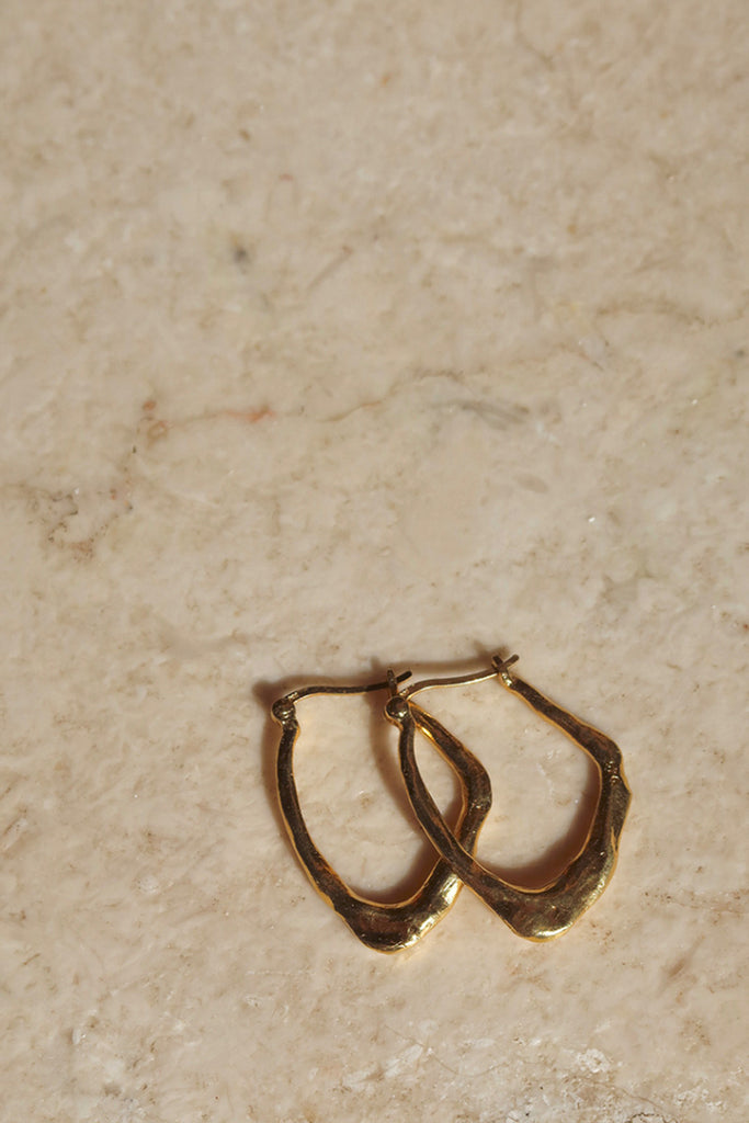 gold plaited small organic shaped earring 