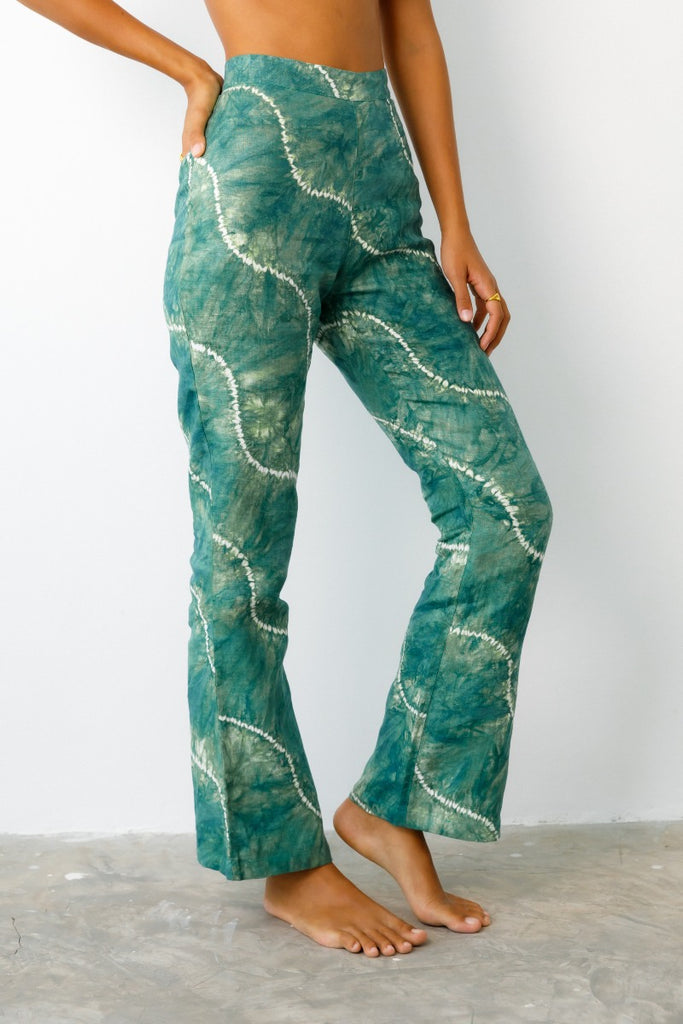 side view of green tie dye pant