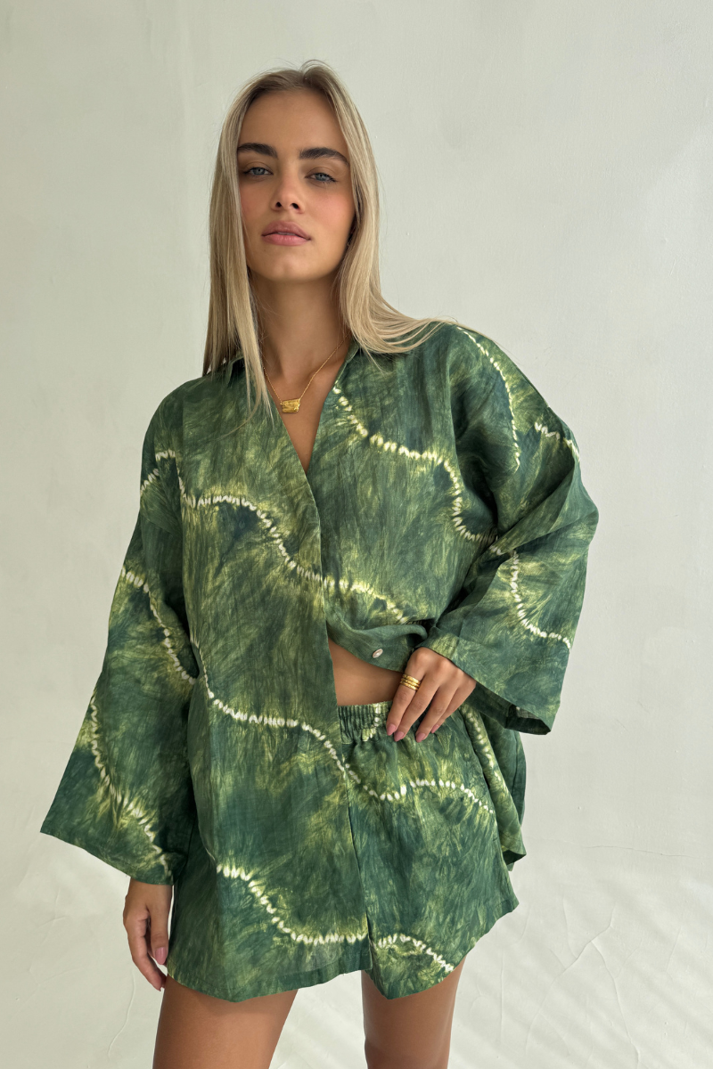 Womens green linen tie dye shirt, styled with matching short, front view