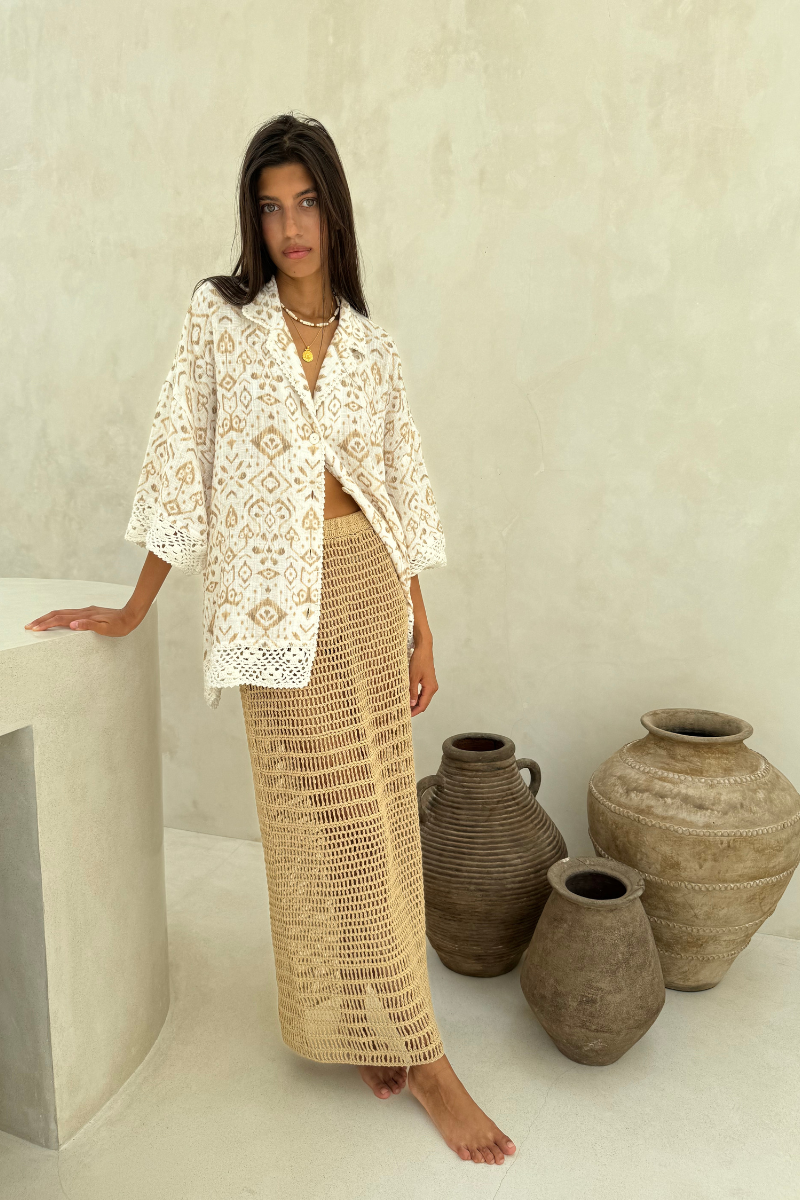 model wearing cotton crochet skirt and artist print shirt