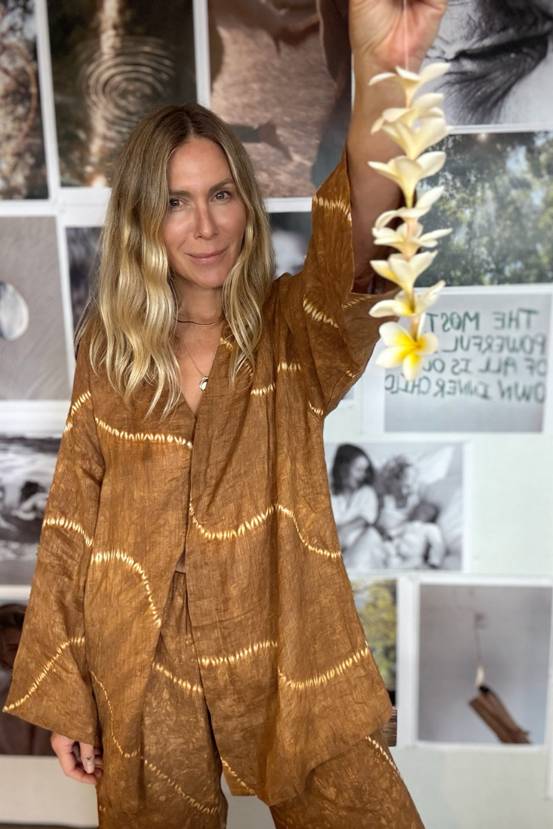 Founder wearing matching linen tan tie dye set