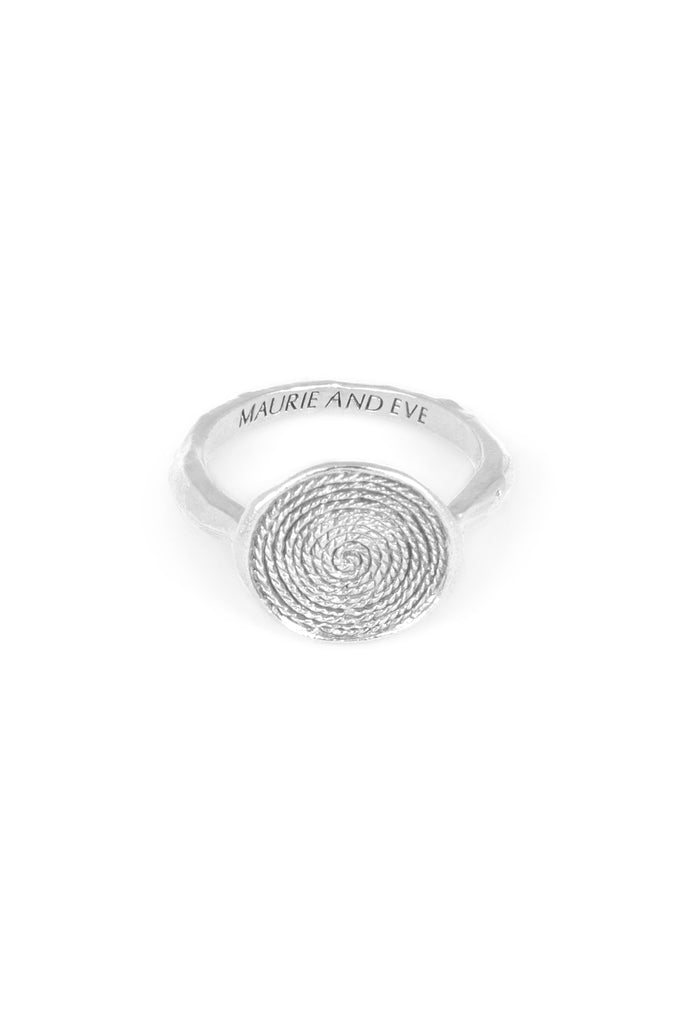 solid silver ring engraved with swirl motif