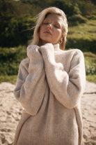 Womens beige wool blend crew neck jumper front view