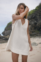 White sleeveless cotton mini dress with crochet panelling