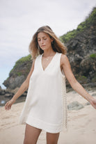 White sleeveless cotton mini dress with crochet panelling