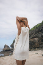 White sleeveless cotton mini dress with crochet panelling