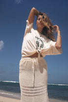 White cotton artist print oversized tee and crochet skirt