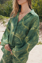 Womens green linen tie dye shirt, close up view