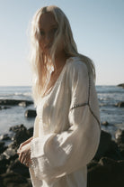 womens cotton cream shirt with contrast stitch side view