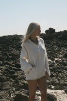 womens cotton cream jumpsuit with contrast stitch side view