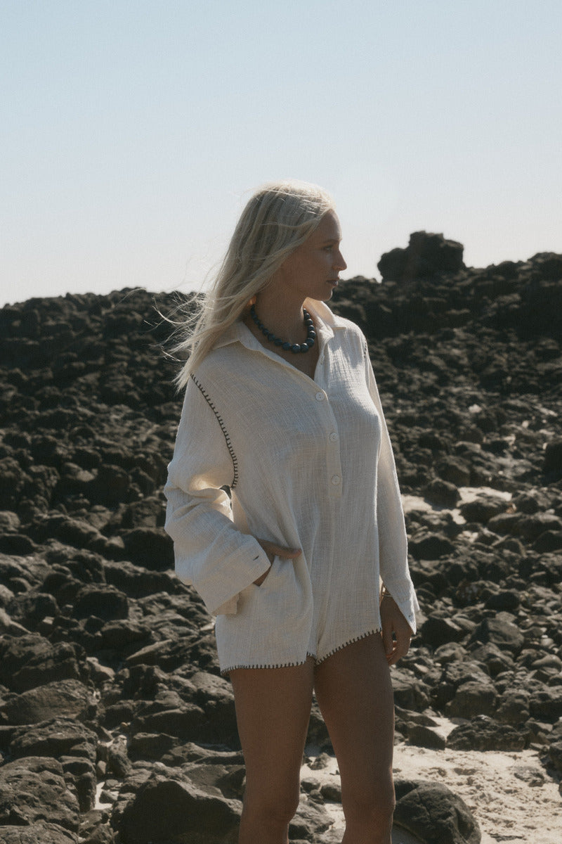 womens cotton cream jumpsuit with contrast stitch side view