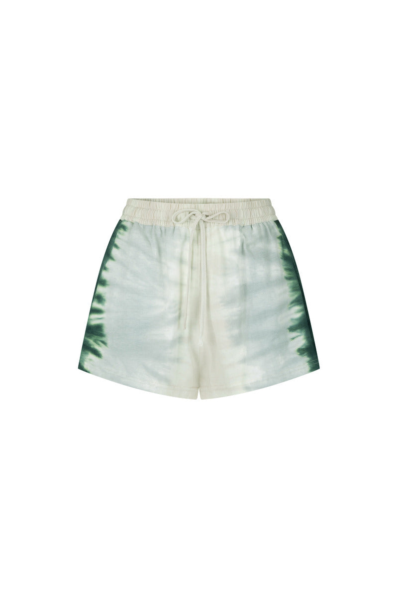 Tie-dye shorts with a white and green pattern on a white background