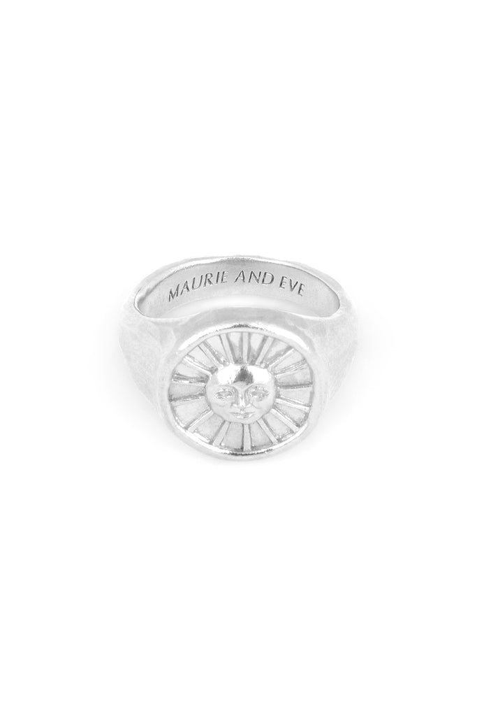 solid silver ring engraved with sun motif