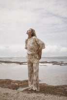 womens cotton hemp tie dye taupe pant, styled with the matching tee, front view