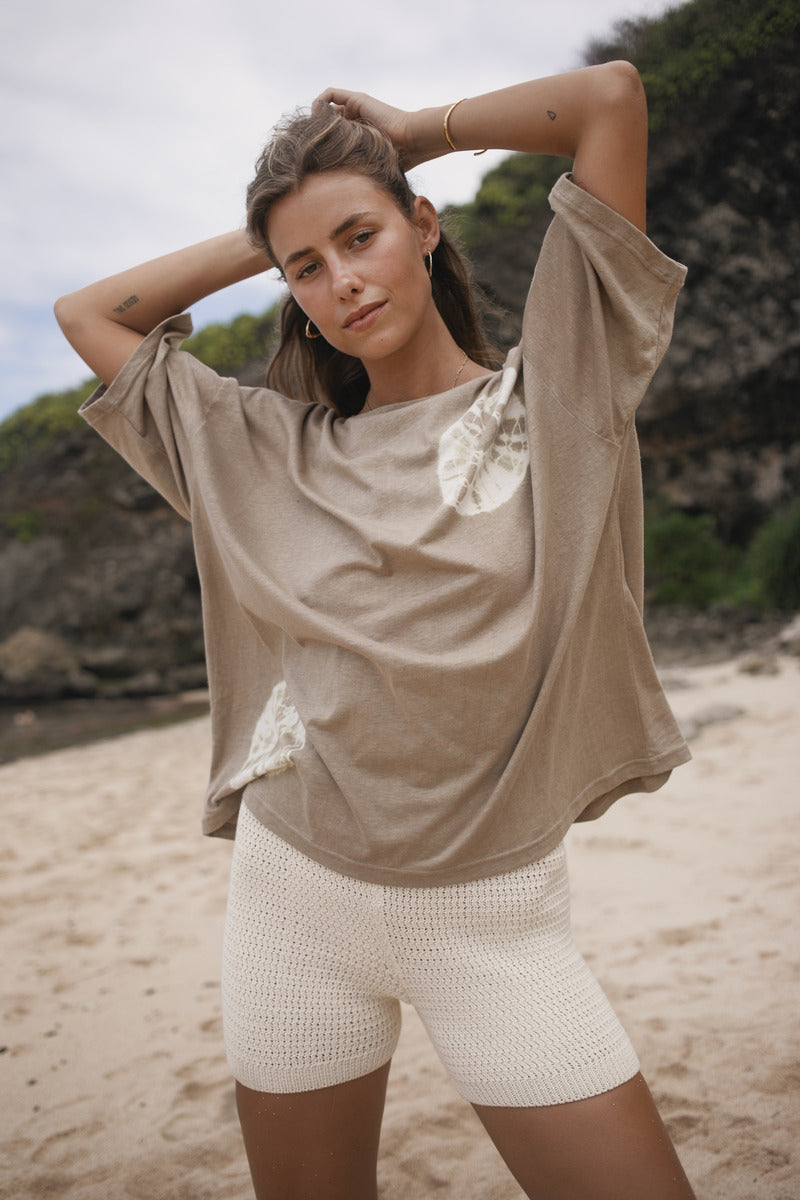 Womens cotton hemp tie dye taupe tee, styled with knit short, front view