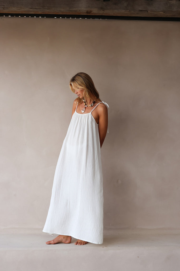 model wearing white cotton maxi dress