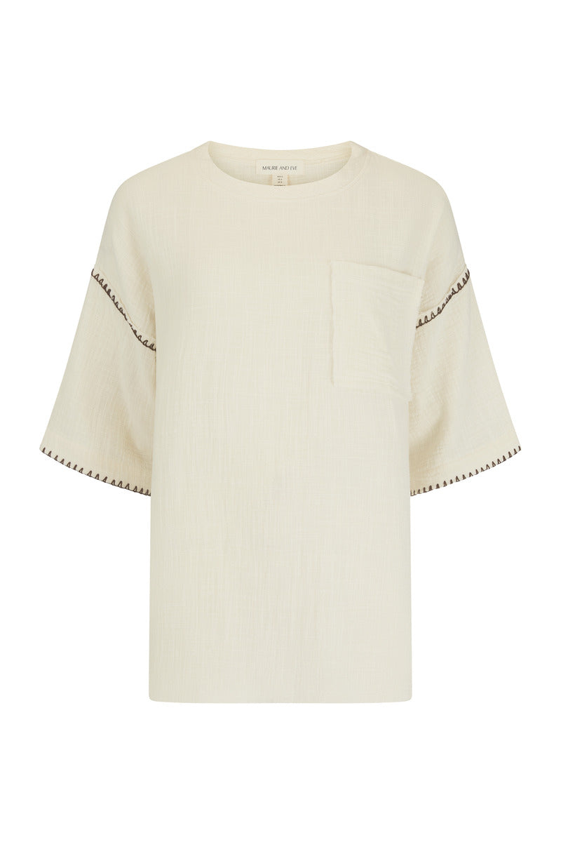 womens cotton cream top with pocket  and contrast stitch front view