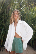 womens white cotton textured shirt with teal short