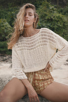 Womens tan cotton tie dye short, styled with crochet top, front view