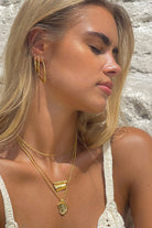 organic shape textured gold plaited hoops with gold layered jewellery