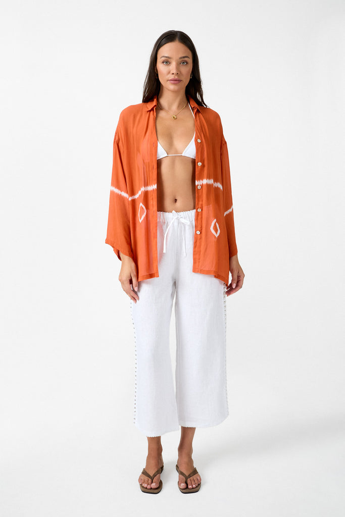 Womens white linen drawstring pant with crochet panels front view