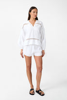 womens white cotton blouse with crochet detailing front view