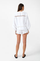 womens white cotton blouse with crochet detailing back view