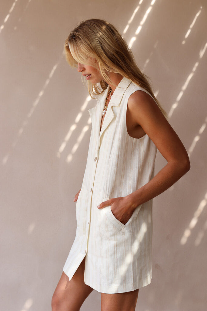 model wearing tonal stripe mini dress with collar 