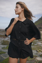Womens black cotton crochet shirt, styled with matching short, front view