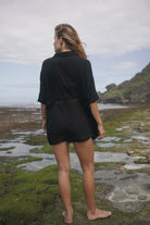 Womens black cotton crochet shirt, back view