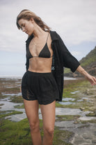 Womens black cotton crochet short, styled with matching shirt, front view