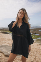 Womens black cotton crochet mini dress, front view