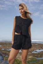 Womens black cotton crochet tank, styled with matching short, front view