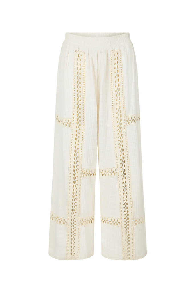 White pants with crochet embroidery 