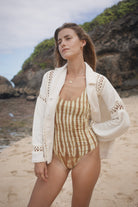Womens tan cotton tie dye bodysuit, styled with cream crochet shirt, front view
