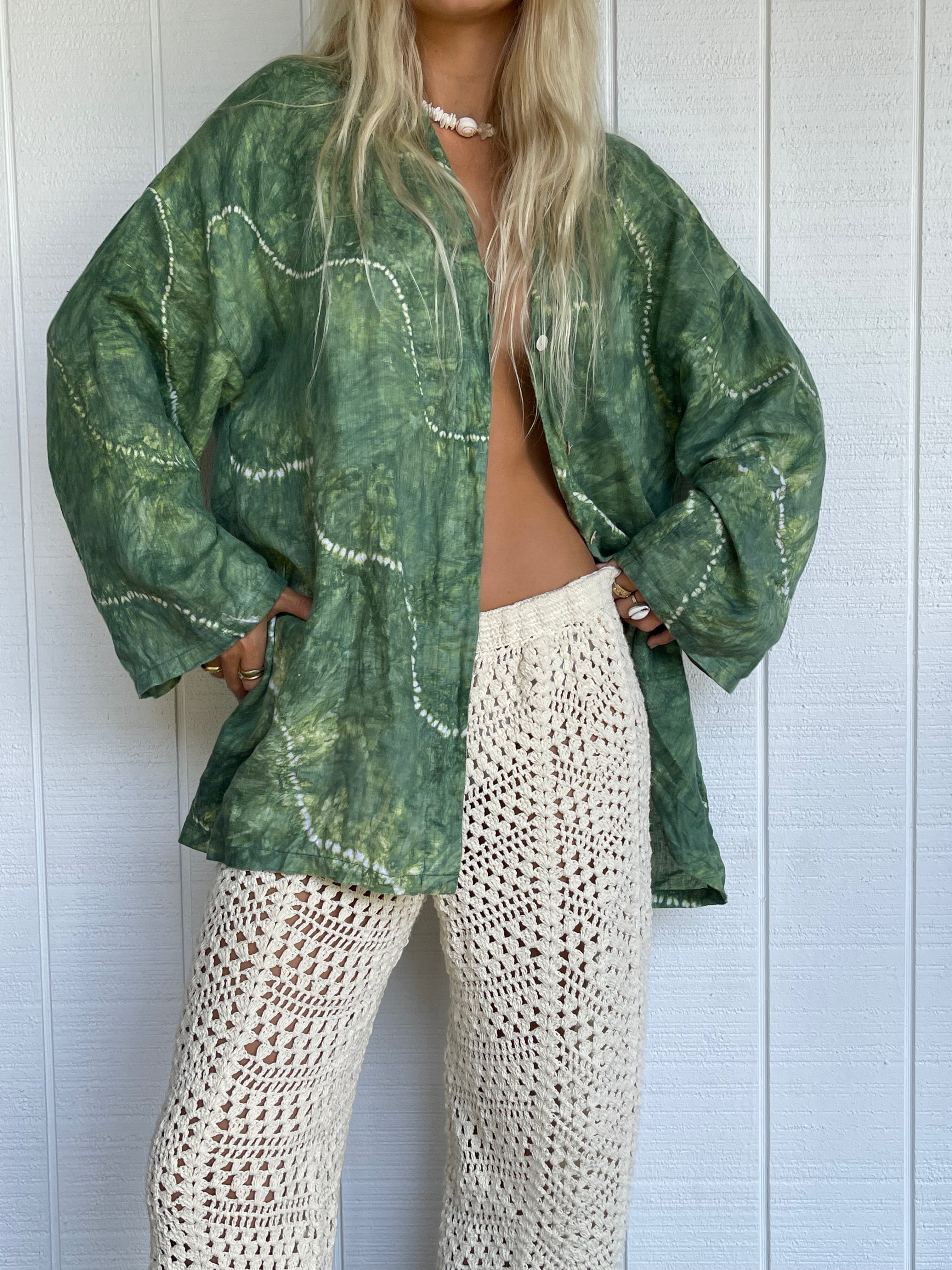 Womens green linen tie dye shirt, styled with crochet pant front view