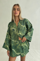 Womens green linen tie dye shirt, styled with matching short, front view