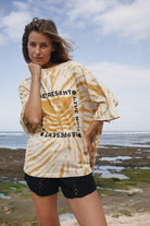 Womens cotton yellow tie dye tee, be present, front view