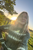 founder wearing our olive tie dye long sleeve top