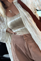 Founder Kel wearing our cotton natural lace shirt front view